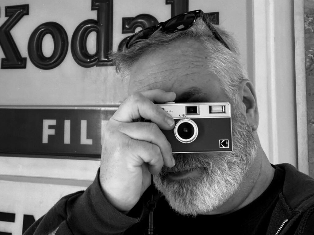 Joe posed with Kodak Ekatar H35 film camera